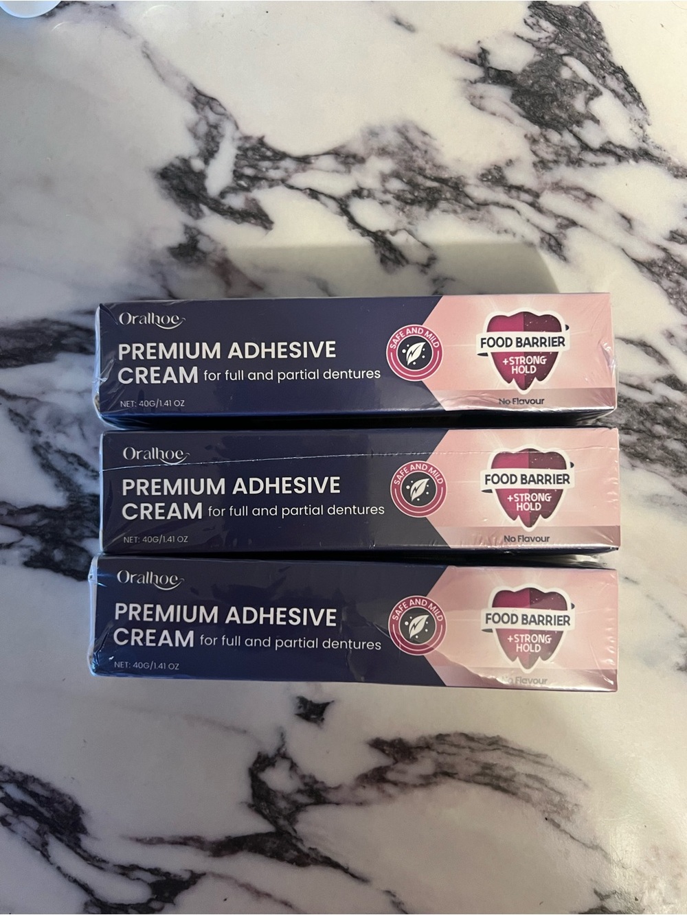 Oralhoc Premium Adhesive Cream for Dentures - Pink & Navy Packaging